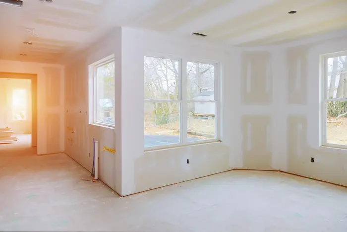 Room with new drywall installed and seams taped before painting