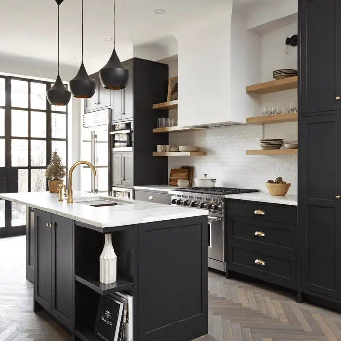 Modern kitchen with dark cabinets, white countertops, open wood shelves and pendant lights